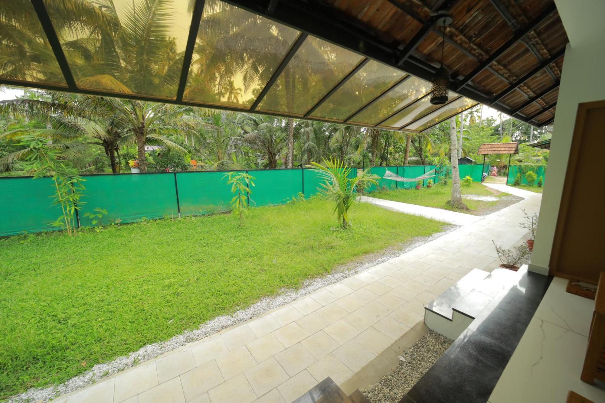 Prakruthi Residency Munroeisland Apartman Mundrothuruth Kültér fotó